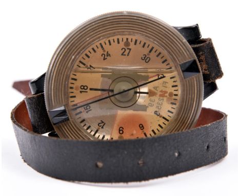 German AK39 pilot’s compass. Plastic casing, marked Fl 23235-1, serial 6023. 60mm in diameter, rotating outer bezel with knur