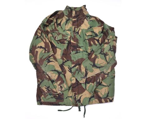 A Denison type camouflage smock,  4 pockets, zip up and 4 button front, with shoulder straps. GC (some service wear) £50-60 