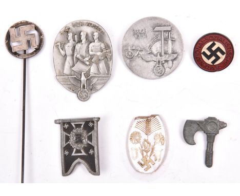 2 Third Reich “Workers’ Day” pin back badges: 1935, and 1st May 1936; a plastic Army Pioneer standard pin back badge; a small