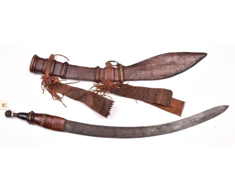 A Sudanese sword, SE curved blade 24½”, with very faint central ridge, polished leather grip with raffia work bands tapering 