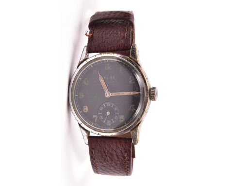 DH marked Helios wristwatch. Serial D 23721 H. Plated case with brushed finish, wear to plating, particularly on lugs, 33mm w