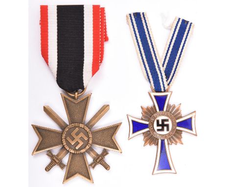 A Third Reich War Merit Cross 2nd class with swords, and a Mother’s Cross, 2nd type, in bronze. GC, with ribbons (the second 