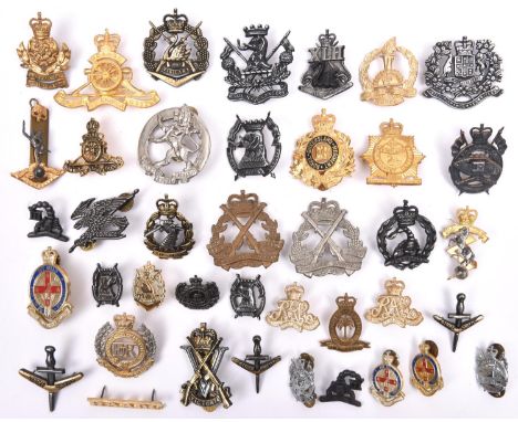24 post 1953 to circa 1980s Australian cap badges,  Armoured, Infantry and Corps, some with spike and clasp fittings, includi