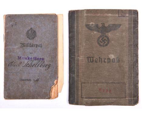 A Third Reich Wehrpass, to Alois Schellberg, a WWI veteran conscripted into the Landwehr in 1943; and his WWI Militarpass, sh