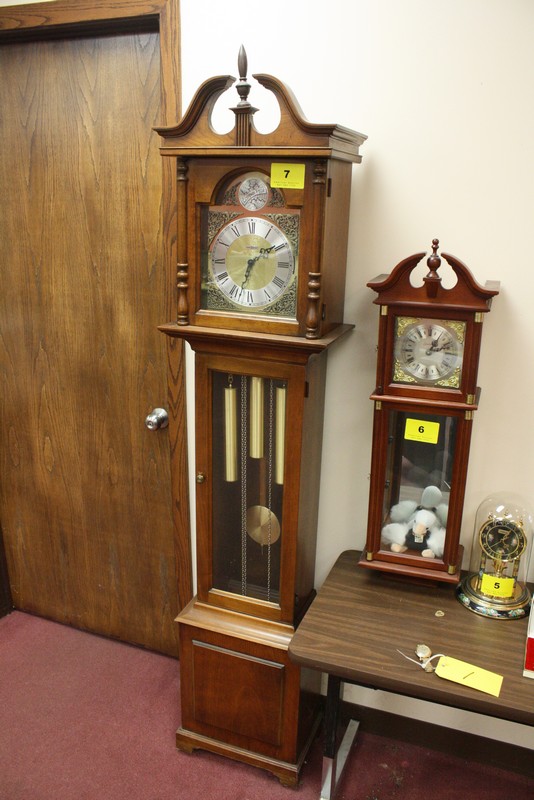 Howard miller tempus fugit grandfather clock.