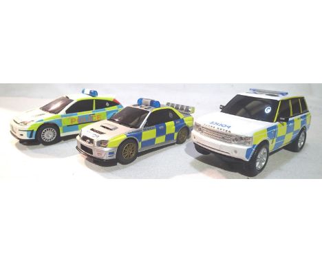 Three Scalextric police cars in good condition, missing two mirrors, unboxed. P&amp;P Group 1 (£14+VAT for the first lot and 
