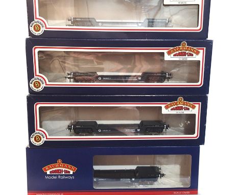 OO scale, Bachmann, 4x bogie well wagons, 33-900A 3x, 33-900E 1x, all GWR grey, excellent condition, boxes with wear. P&amp;P