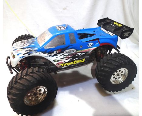 Team Losi Monster Truck, fitter M26 blue top engine with sport silencer, alloy chassis etc, L: 55 cm, requires cleaning, fitt