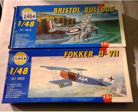 Two SMER 1/48 scale Bi plane kits; Bulldog and Focker D VIII, appear as new, wear to boxes, unchecked. P&amp;P Group 1 (£14+V