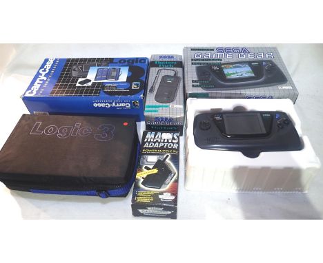 Sega Game Gear handheld game system, battery pack, aftermarket carry case and aftermarket mains adapter, each boxed. P&amp;P 