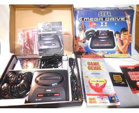 Sega Mega Drive II 16 bit console, with two controllers, power supply, AV connection, Aladdin game cartridge, and aftermarket