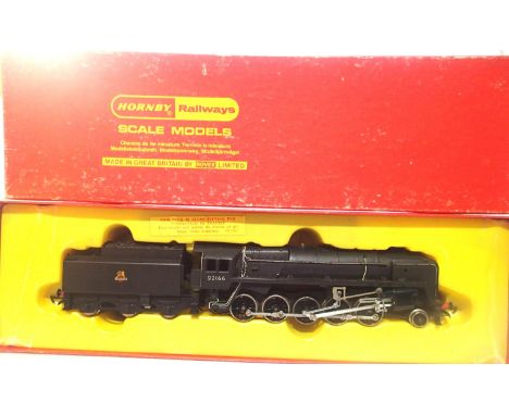 OO scale Hornby R550, class 9F, Black, 92166, Early Crest in very good condition, box is fair. P&amp;P Group 1 (£14+VAT for t