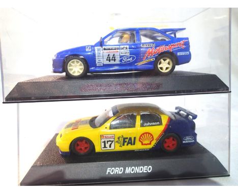Two Scalextric Fords to include Mondeo and Escort both in very good to excellent condition, in plastic boxes, missing one mir