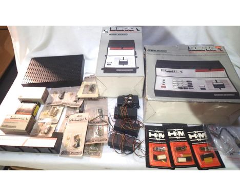 Hornby Zero 1 Master controller x6, slave control x6, display control module, loco module x9, accessory module x4 and others,