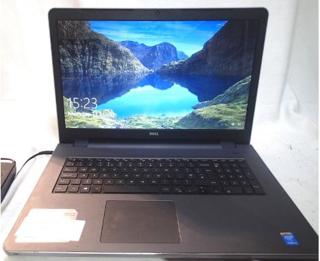 Dell Inspiron 17 5000 series laptop computer, operating Windows 10 64 bit, 8GB ram with charger, username and password suppli