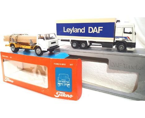 Tekno Big Trucks, x2 Ford D0810 with timber load, missing/chain, DAF 95 box van, Leyland DAF, missing headlight, both in very