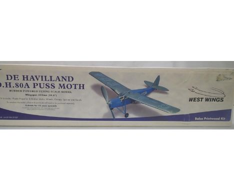 Flying scale model; West Wings De Havilland Puss Moth, L: 62 cm, Balsa/Tissue, rubber powered, as new, wear to box. P&amp;P G