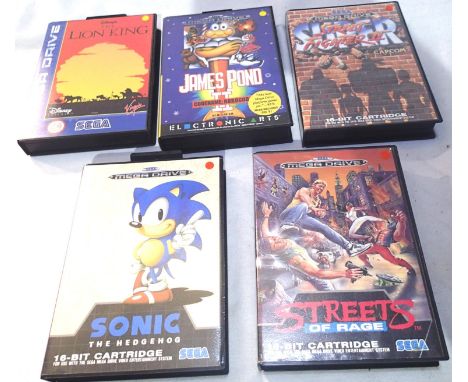 Five Sega Mega Drive game cartridges: Sonic The Hedgehog, The Lion King, James Pond II, Streets of Rage and Super Street Figh