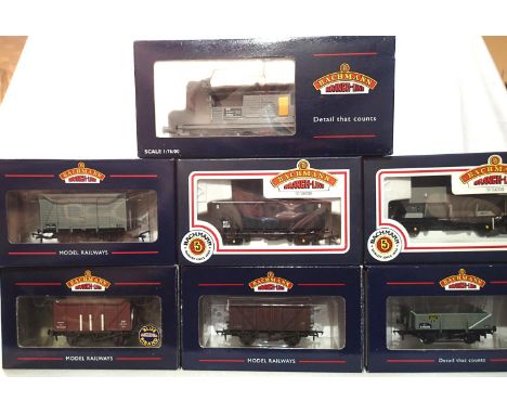 OO scale, Bachmann rake of 7 wagons, all in BR Livery, includes Hopper, MEA, Queen Mary brake etc, mostly in excellent condit