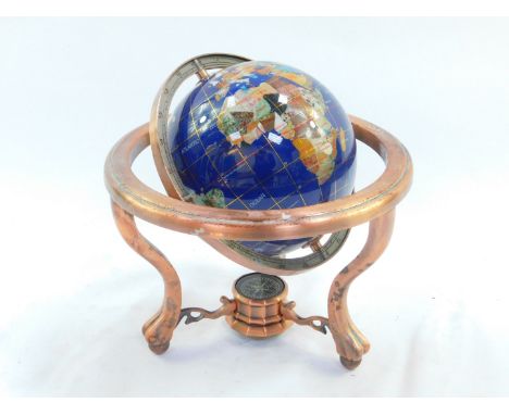 A hardstone terrestrial globe, in a copper gimbal frame, globe 14cm diameter.