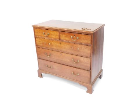 A George III oak chest, of two short over three long graduated drawers, raised on bracket feet, 93cm high, 100.5cm wide, 51.5
