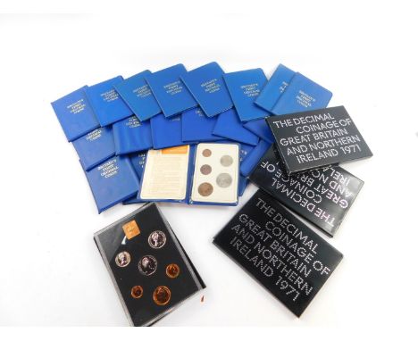 Four proof sets of decimal coinage of Great Britain and Northern Ireland 1971, together with twenty wallets containing Britai