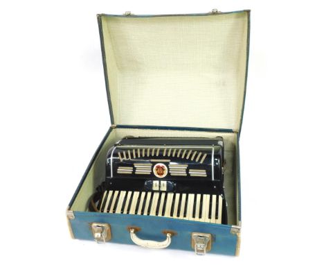 A Calvi piano accordion, 120 button, with clarinet and mastro function, cased.