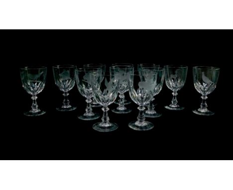 A set of twelve Caithness glass wine glasses, engraved with game birds, wild and domestic animals.