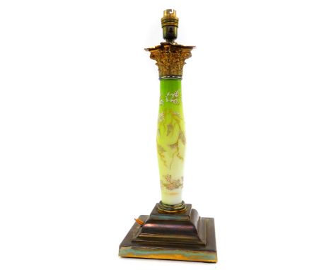 An early 20thC brass and opalescent glass electric table lamp, of Corinthian column form, the column enamel decorated with vi