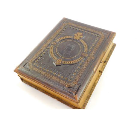 A Victorian gilt tooled leather musical photograph album containing portrait photographs and carte de visite, the front cover