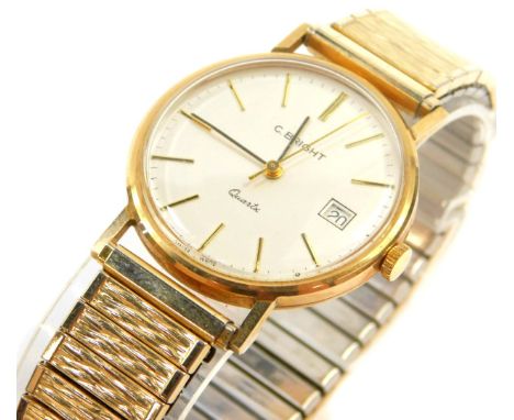 A Timex 9ct gold cased gentleman's wristwatch for C Bright, champagne dial with gold batons, centre seconds, date aperture, b