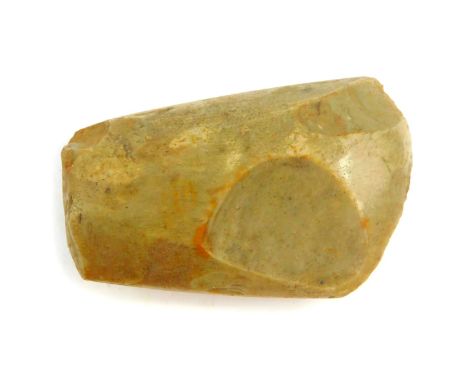 A Neolithic axe head, purportedly from The New Forest, Hampshire, 8.5cm high.