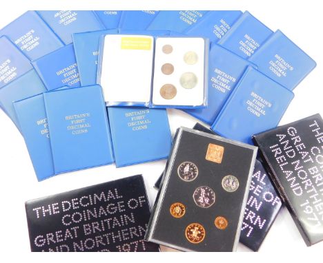 Four proof sets of decimal coinage of Great Britain and Northern Ireland 1971, together with twenty wallets containing Britai
