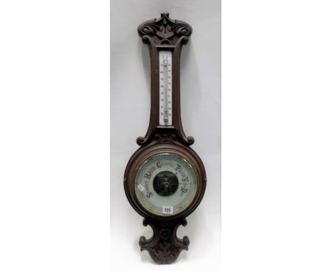 Oak cased aneroid banjo barometer/thermometer, the case carved, height 82cm