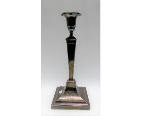 Edwardian Scottish silver weighted candlestick by Hamilton &amp; Inches, of classical square tapered form and on square base 