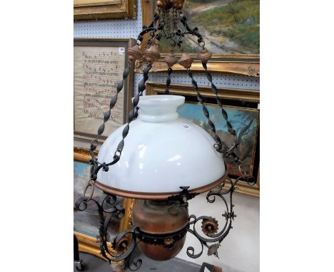 A 19th Century French wrought metal and copper painted ceiling oil lamp, with original white opaque glass shade, diameter of 