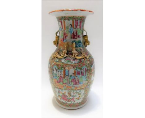 Cantonese famille rose flare neck baluster vase with applied Fo dog handles and coiled dragons to the shoulders, decorated wi