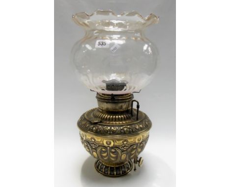 19th Century brass embossed oil lamp with clear etched glass shade, height 45cm