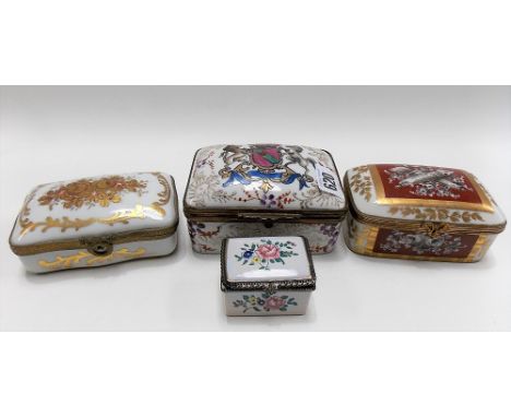 Contintental enamel on metal hinge lidded box together with three other porcelain hinge lidded boxes