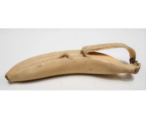 Good 19th Century carved ivory model of a peeled banana, length 15cm