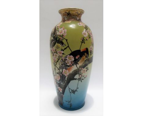 Japanese satsuma vase painted with birds amongst blossoming branches upon a green and blue blush ground, signed to the base, 