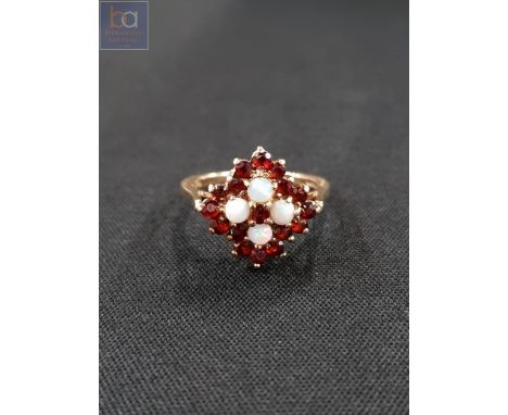 9 CARAT GOLD GARNET AND OPAL RING 