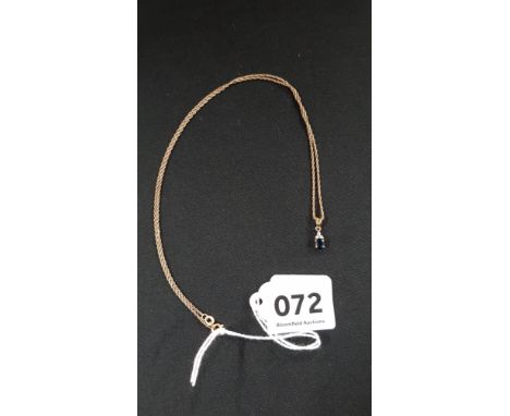 9 CARAT GOLD DIAMOND AND SAPPHIRE DROP ON 9 CARAT CHAIN 
