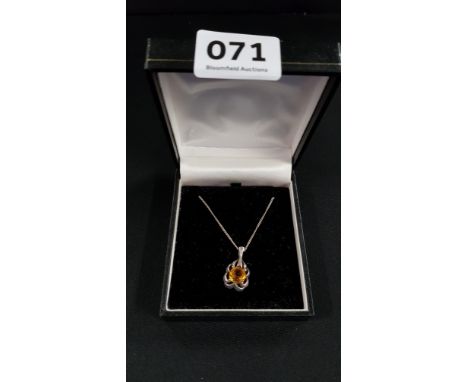 SILVER AND TOPAZ PENDANT ON SILVER CHAIN