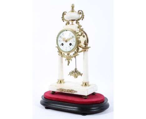 A French gilt-metal and white marble mounted pedestal striking mantle clock on ebonised base, late 19th/early 20th century, t