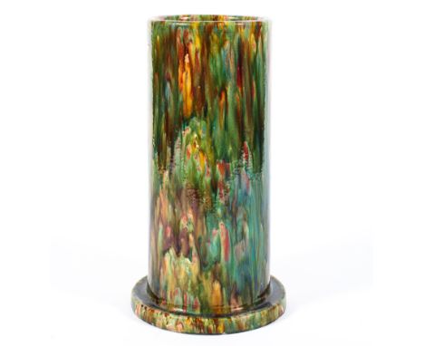 A late 19th century large majolica stick stand, of cylindrical form, enriched in mottled Whieldon style glazes, 63.5cm high