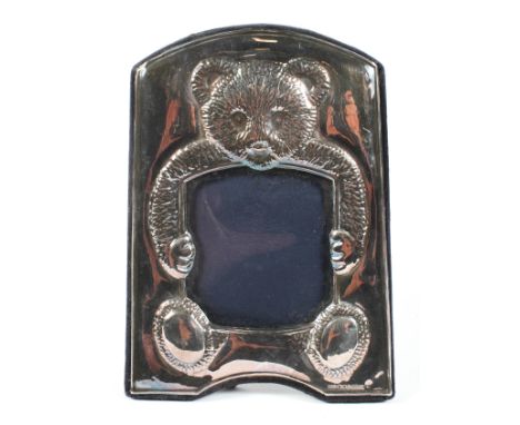 A vintage silver mounted child's photograph frame, the embossed mount depicting a teddy bear, hallmarked London 1991 by RBB, 