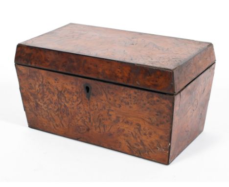 A 19th century burr walnut tea caddy, of rectangular form, containing two internal covers decorated with stringing, 21cm wide