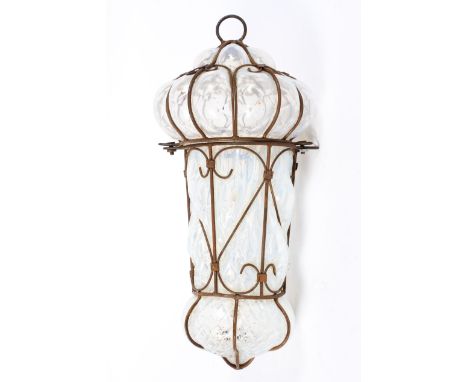 A late 19th century hanging lantern, the brasswork frame housing a textured vaseline glass shade, height 33cm