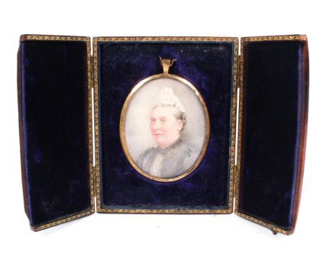 A Victorian portrait miniature of a lady, watercolour on ivory, painted with a bust-length portrait of a lady wearing a laced